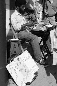 Gentry composing on Haight Street in San Francisco